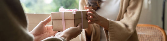 A festive holiday-themed banner showcasing unique gift ideas for the person who has everything.