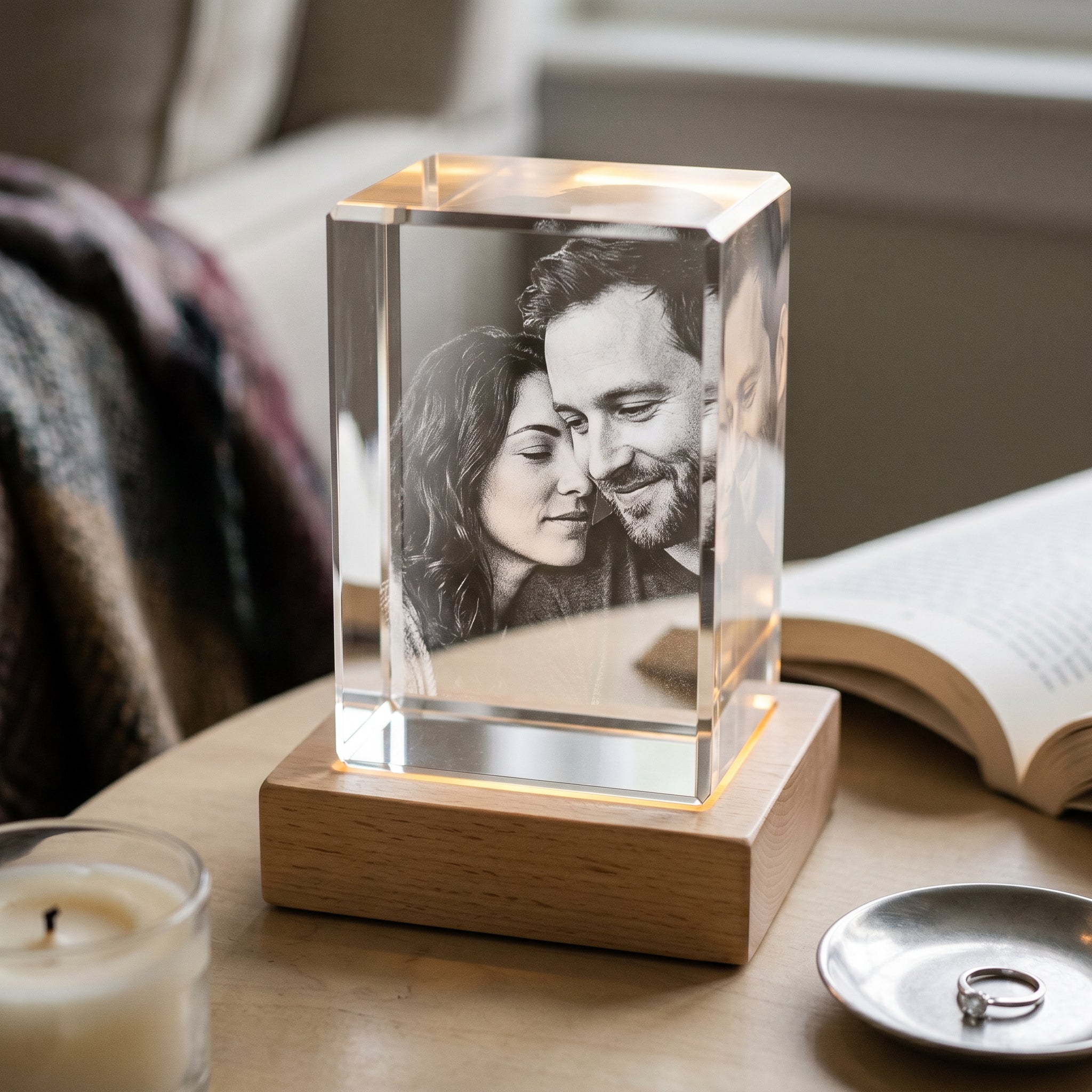 Natural blonde rectangle 3D Crystal with grayscale candid couple, tin keepsake dish with diamond band on a side table for a 10th tin anniversary