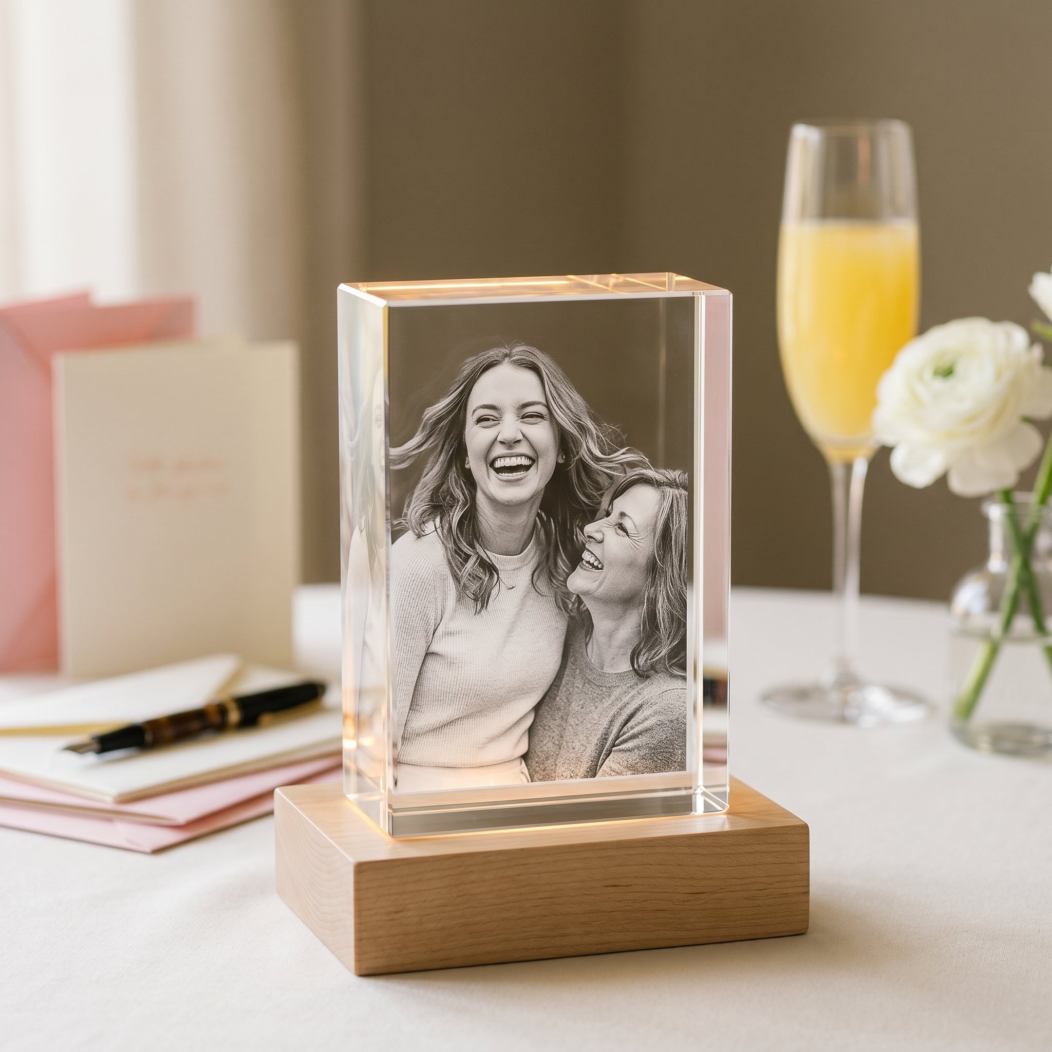 Beyond Memories rectangle 3D photo crystal of bride and mother laughing on a bridal shower brunch table with cards and a fountain pen.