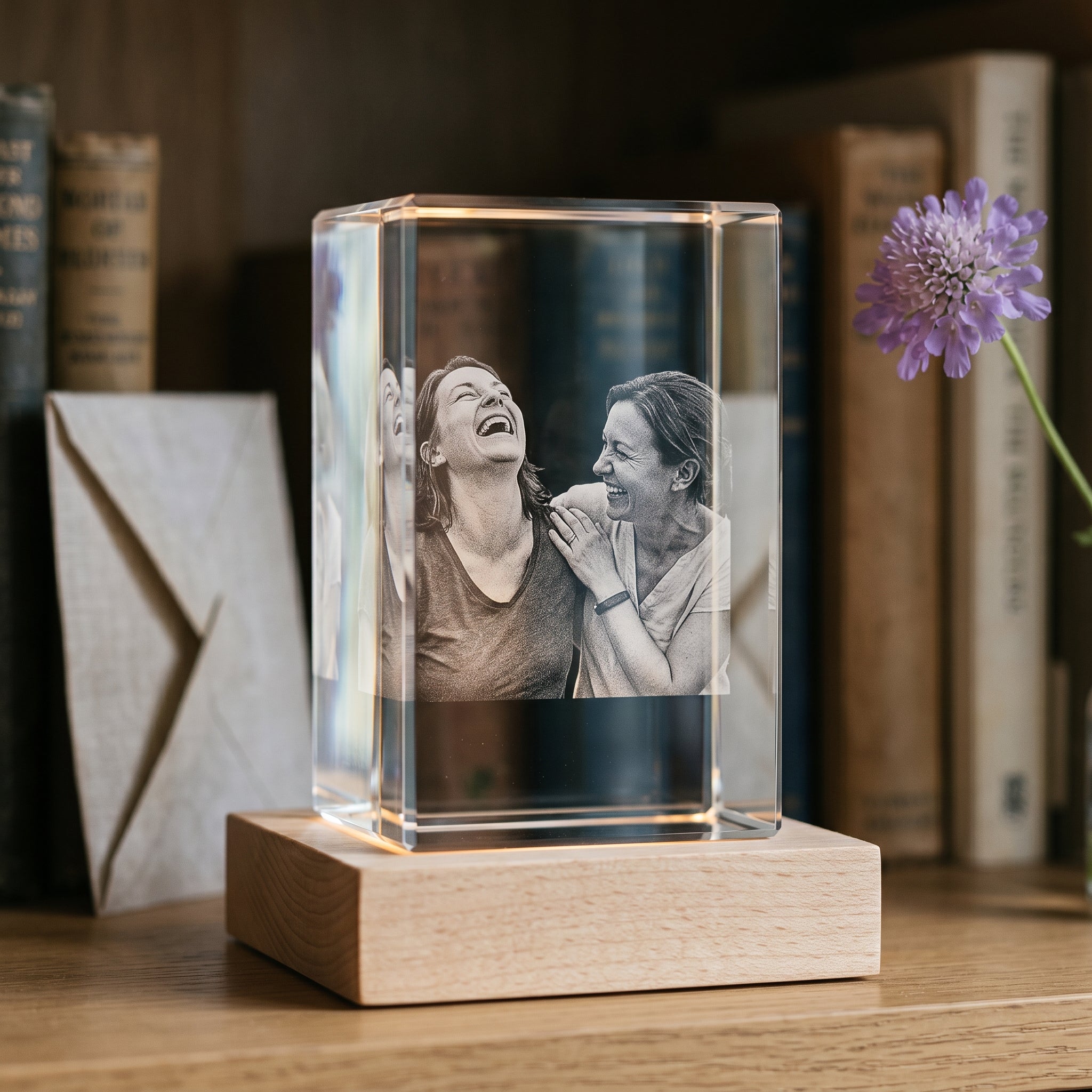 BM 3D crystal, two friends laughing candidly, light wood base, in memory of friend keepsake